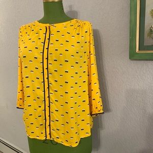 Button down collarless top with camera print